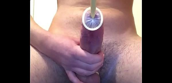  Amature inserts condom in urethra